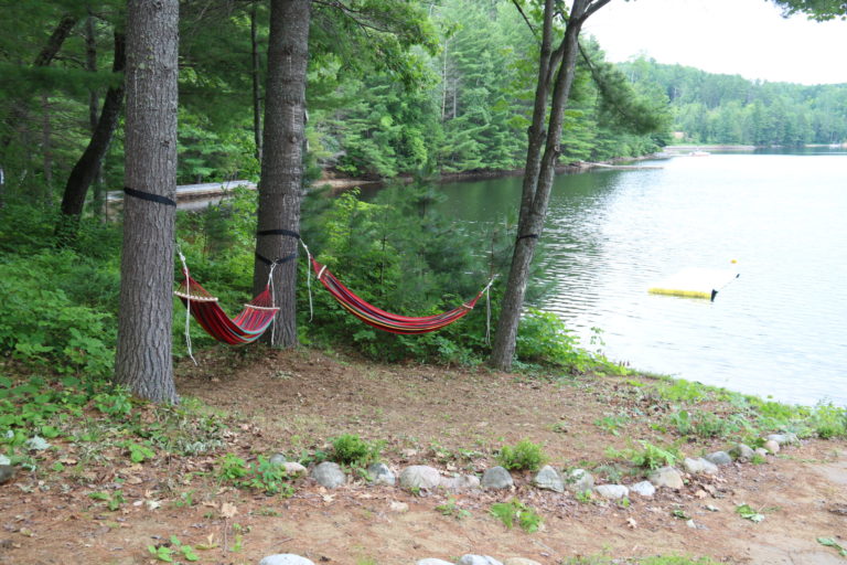 hammocks outside log cottage near Ottawa