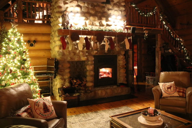 stone fireplace with stockings at Quebec cottage rental