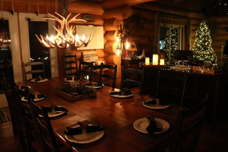 dining table with antler chandelier