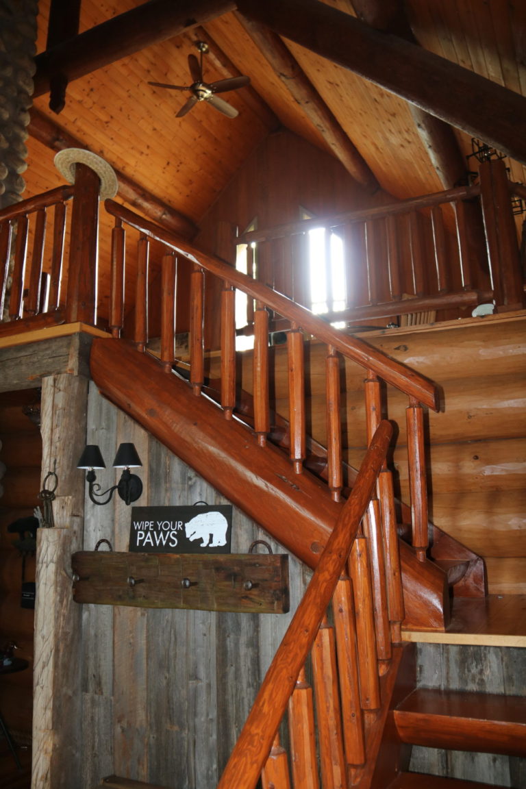 stairs leading to loft log quebec cottage rental