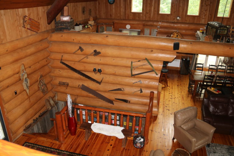 aerial view to main level of log cottage rental in quebec