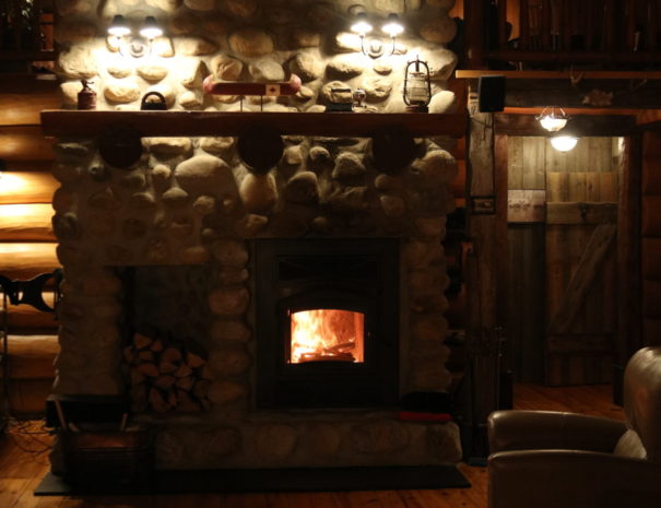 stone fireplace at Quebec cottage rental