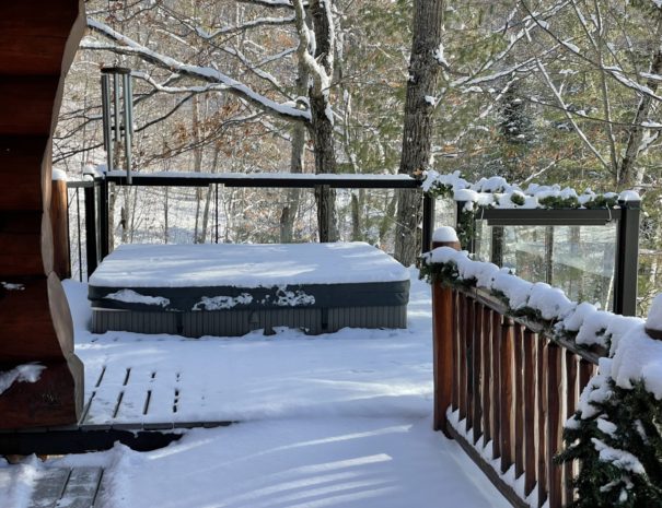 hot tub covered in snow at lake cottage ottawa