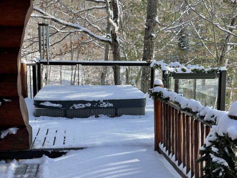 hot tub covered in snow at lake cottage ottawa