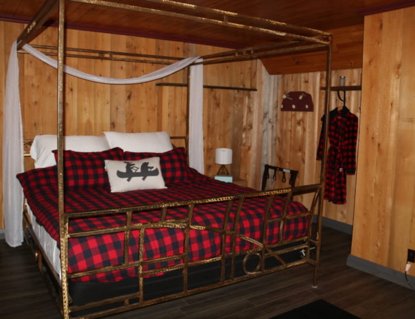 king bed with red duvet cottage rentals near ottawa