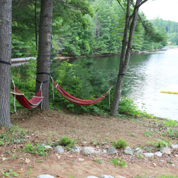 red hammocks by water at cottage rentals near ottawa