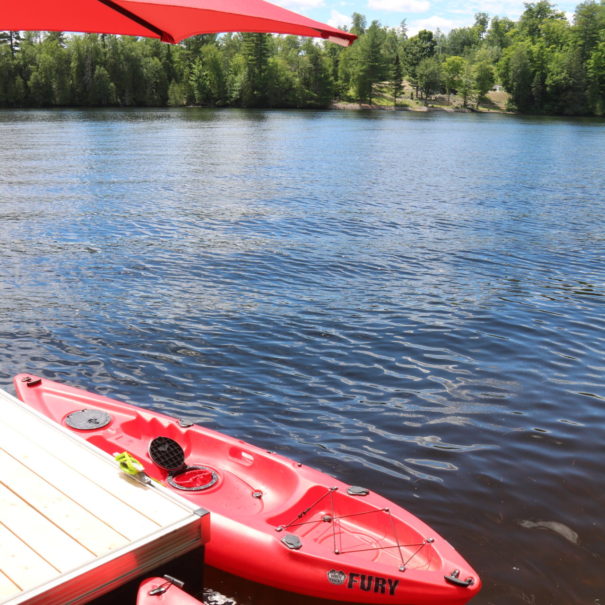 red kayaks on dock